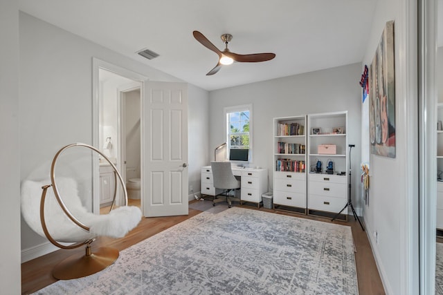 interior space featuring dark hardwood / wood-style flooring and ceiling fan