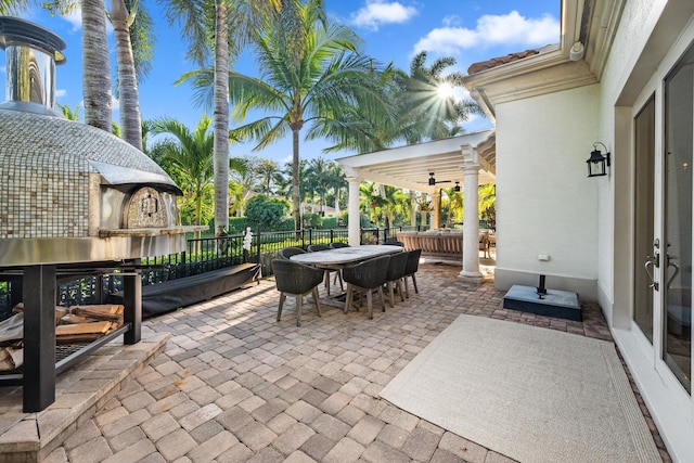 view of patio / terrace featuring ceiling fan