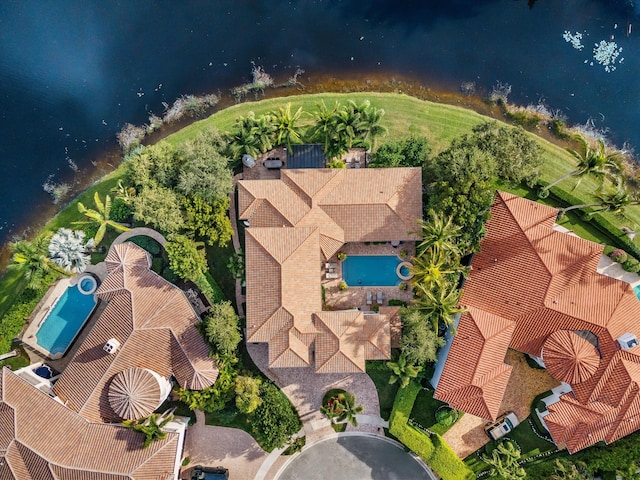 bird's eye view with a water view