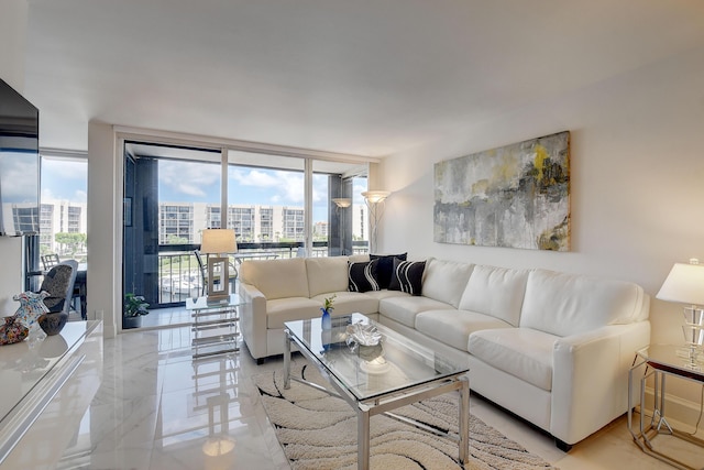 living room featuring a wall of windows