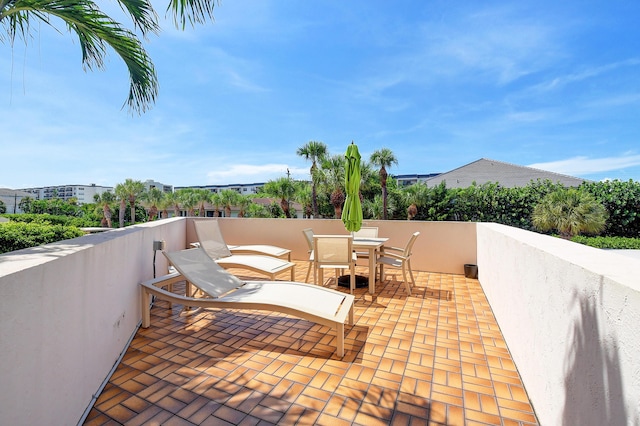 view of patio / terrace with a balcony