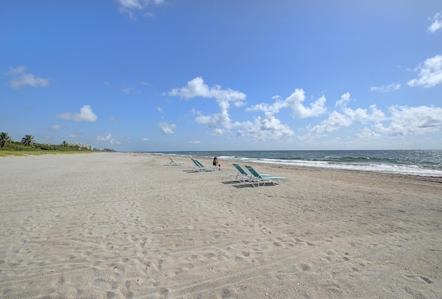 property view of water featuring a beach view