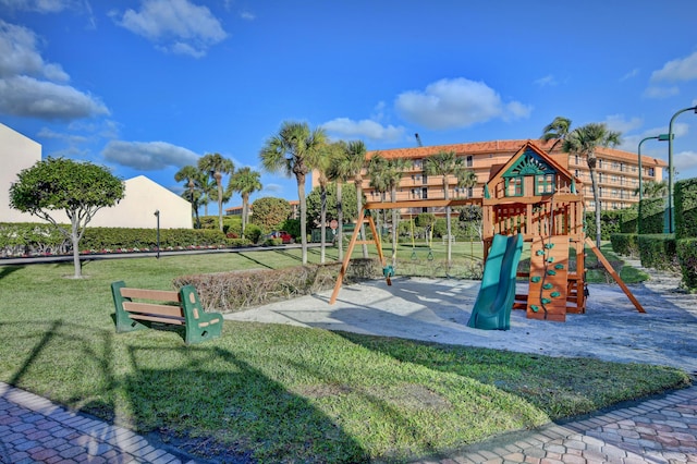 view of play area featuring a lawn