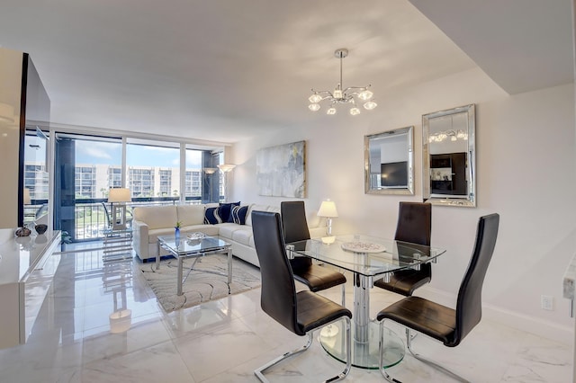 dining space featuring floor to ceiling windows and an inviting chandelier