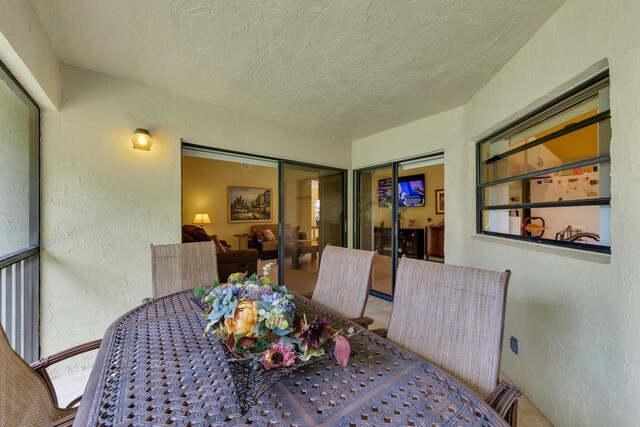 5951 Parkwalk Dr, Boynton Beach, FL 33472 - dining room with a textured wall and a textured ceiling