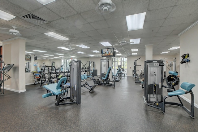 gym featuring a paneled ceiling