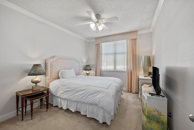 carpeted bedroom with ceiling fan, ornamental molding, and a textured ceiling