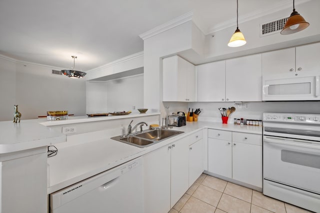 kitchen with pendant lighting, white appliances, white cabinetry, and sink