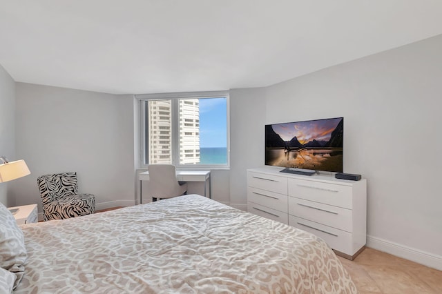 bedroom with light tile patterned flooring