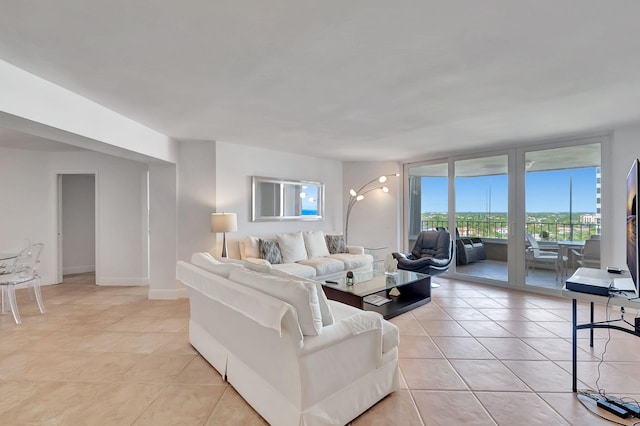 tiled living room with expansive windows