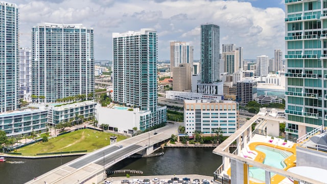 property's view of city featuring a water view