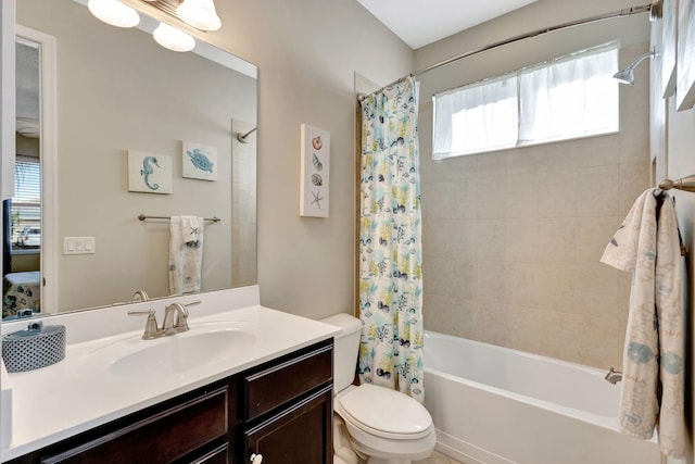 full bathroom with vanity, toilet, and shower / bath combo with shower curtain