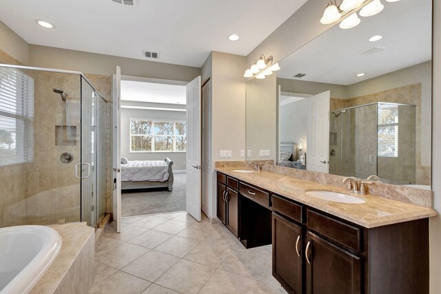 bedroom featuring light colored carpet and a tray ceiling