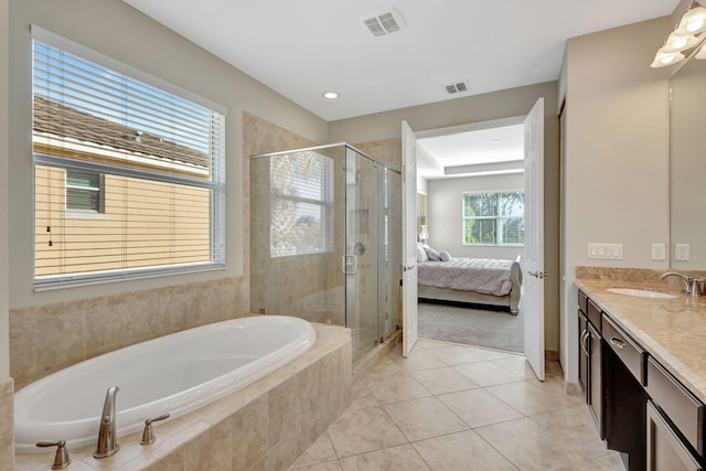 bathroom with vanity, separate shower and tub, and tile patterned flooring