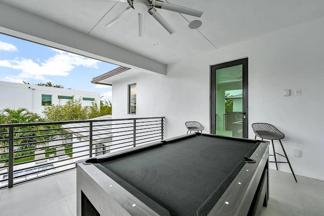 game room featuring ceiling fan, pool table, and light tile patterned floors