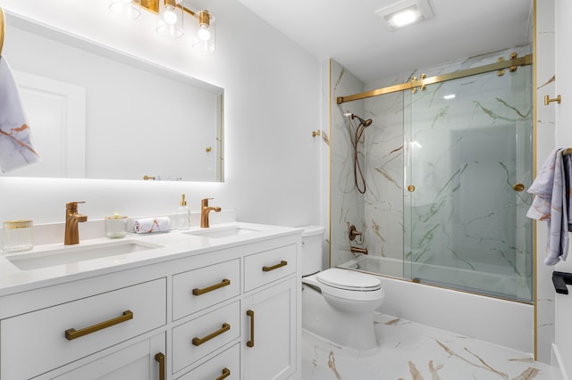 bathroom featuring double vanity, marble finish floor, enclosed tub / shower combo, and a sink