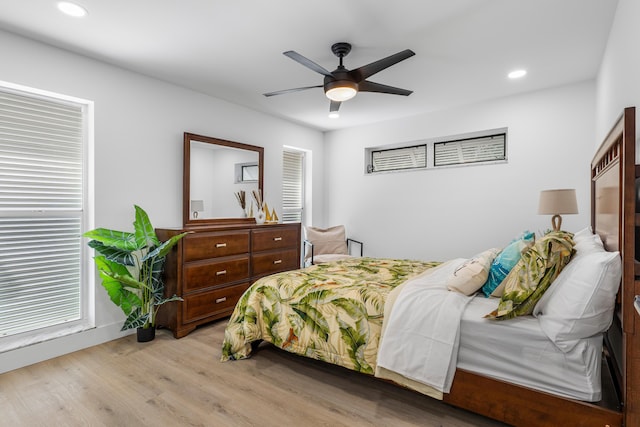 bedroom with recessed lighting, ceiling fan, and light wood finished floors