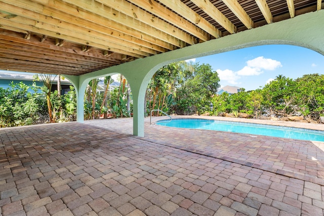 view of pool featuring a patio