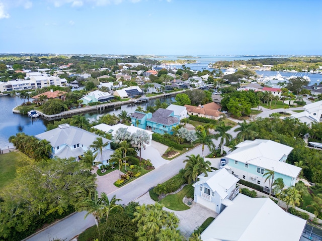 aerial view with a water view and a residential view