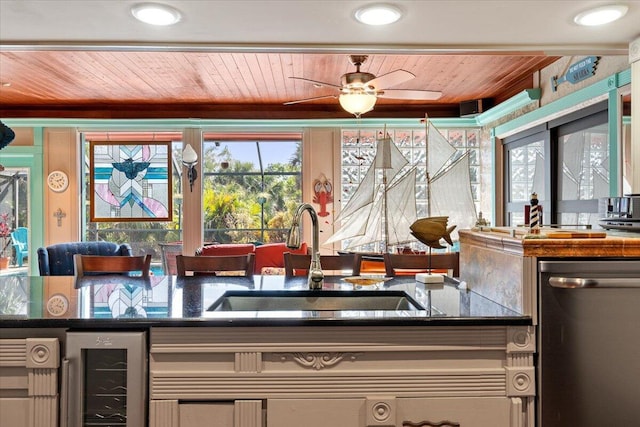 kitchen with sink, dishwasher, ceiling fan, wooden ceiling, and beverage cooler