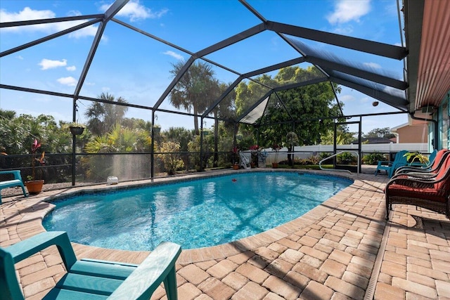 view of pool featuring a lanai and a patio area