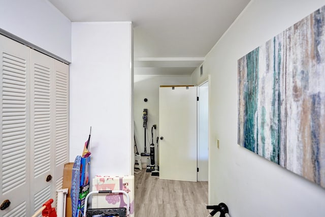 hallway with light wood-type flooring