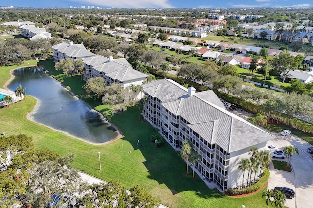 drone / aerial view with a water view