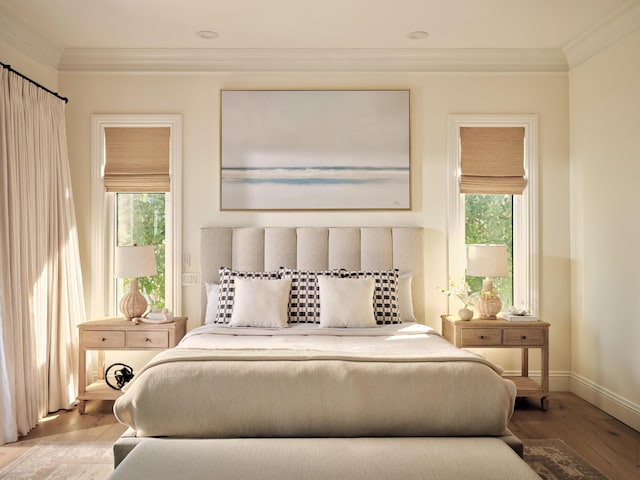 bedroom featuring ornamental molding, multiple windows, and light wood-type flooring