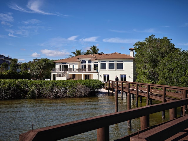 view of dock with a water view