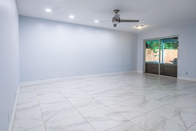 unfurnished room with ceiling fan