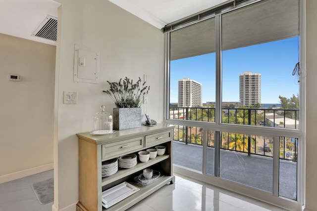 interior space featuring light tile patterned floors