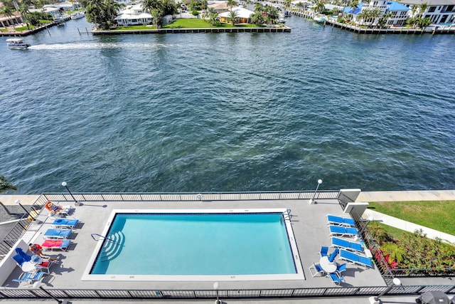 exterior space with a patio and a water view