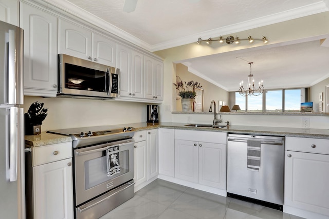 kitchen with sink, crown molding, stainless steel appliances, and white cabinets