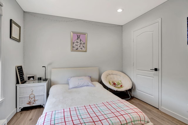 bedroom featuring light wood-type flooring