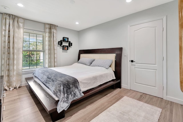 bedroom featuring wood-type flooring