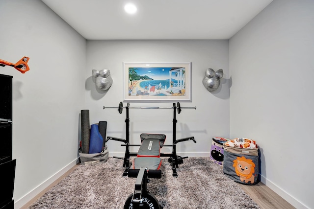 workout room with light wood-type flooring