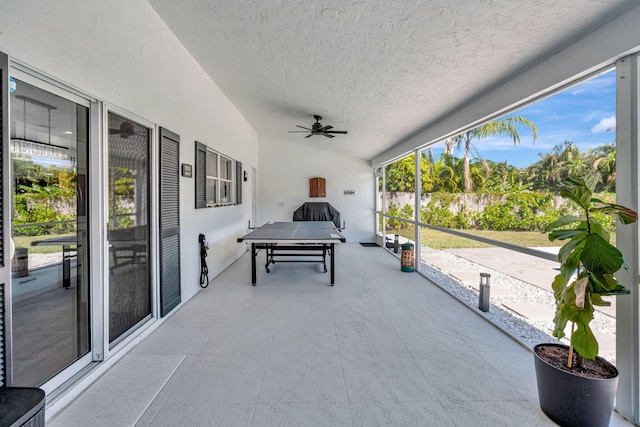 view of patio featuring ceiling fan