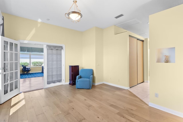 unfurnished room featuring light hardwood / wood-style flooring