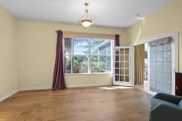 unfurnished dining area with light wood-type flooring