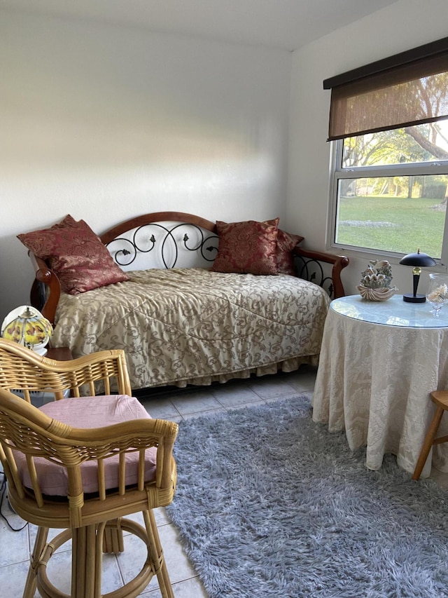 bedroom with tile patterned floors