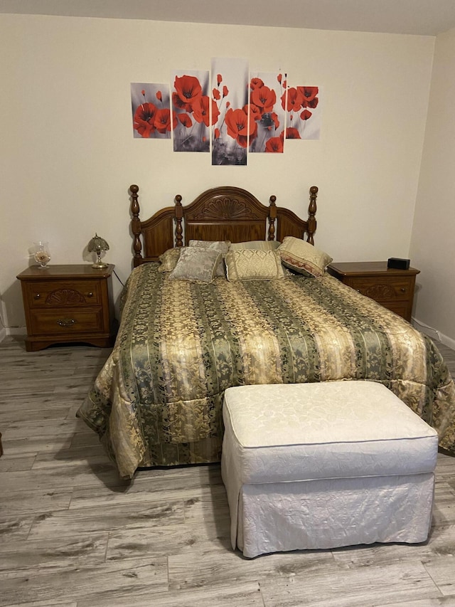 bedroom featuring hardwood / wood-style floors