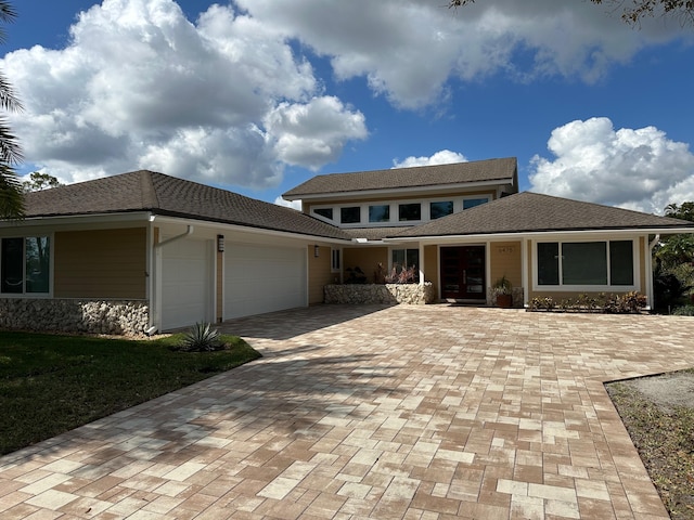 view of front of house with a garage