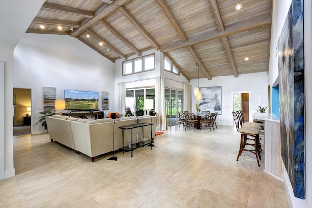 living room with wood ceiling, high vaulted ceiling, and beamed ceiling