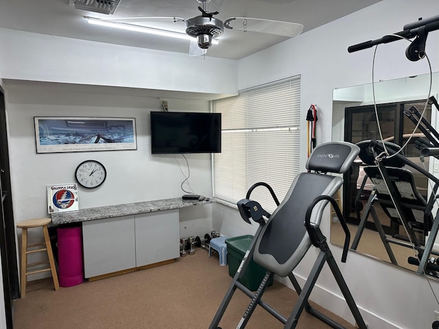 exercise room with carpet floors