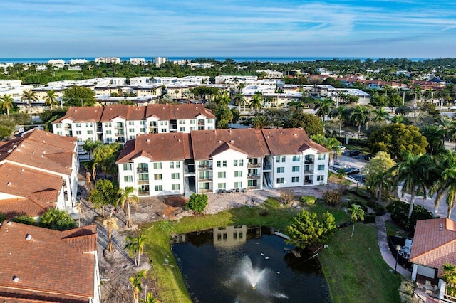 drone / aerial view featuring a water view