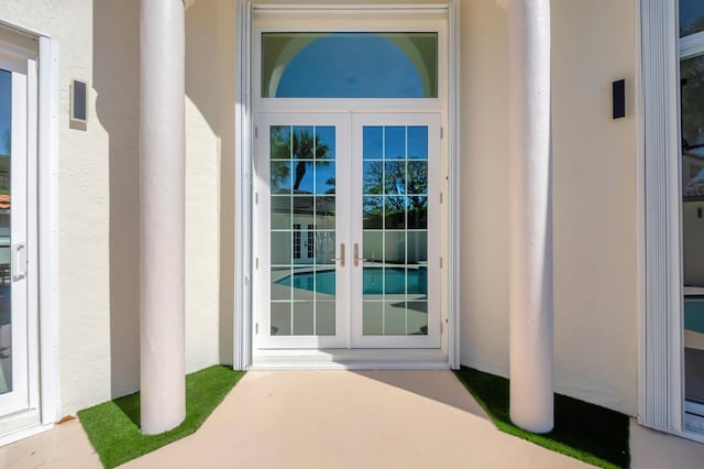 doorway to property featuring french doors