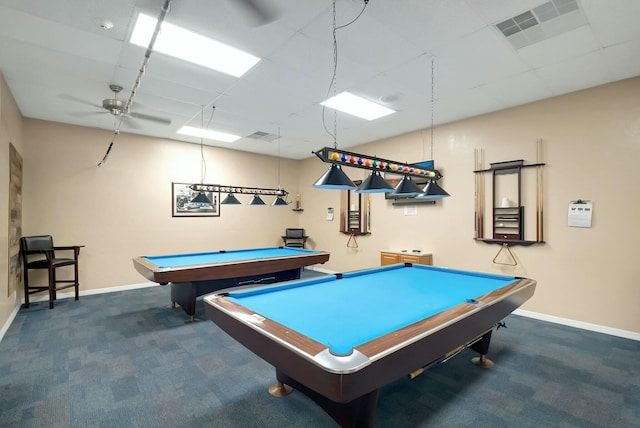 game room featuring billiards, dark carpet, and a drop ceiling