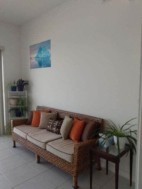 living room with light tile patterned floors