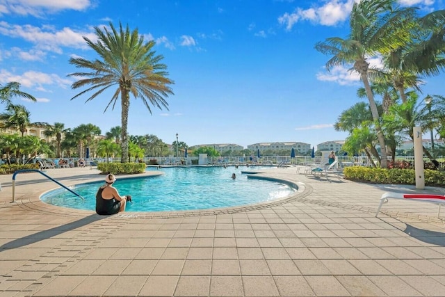 view of pool featuring a patio