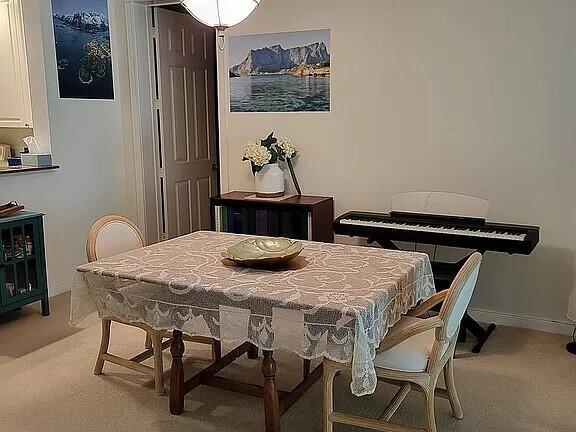 view of carpeted dining room